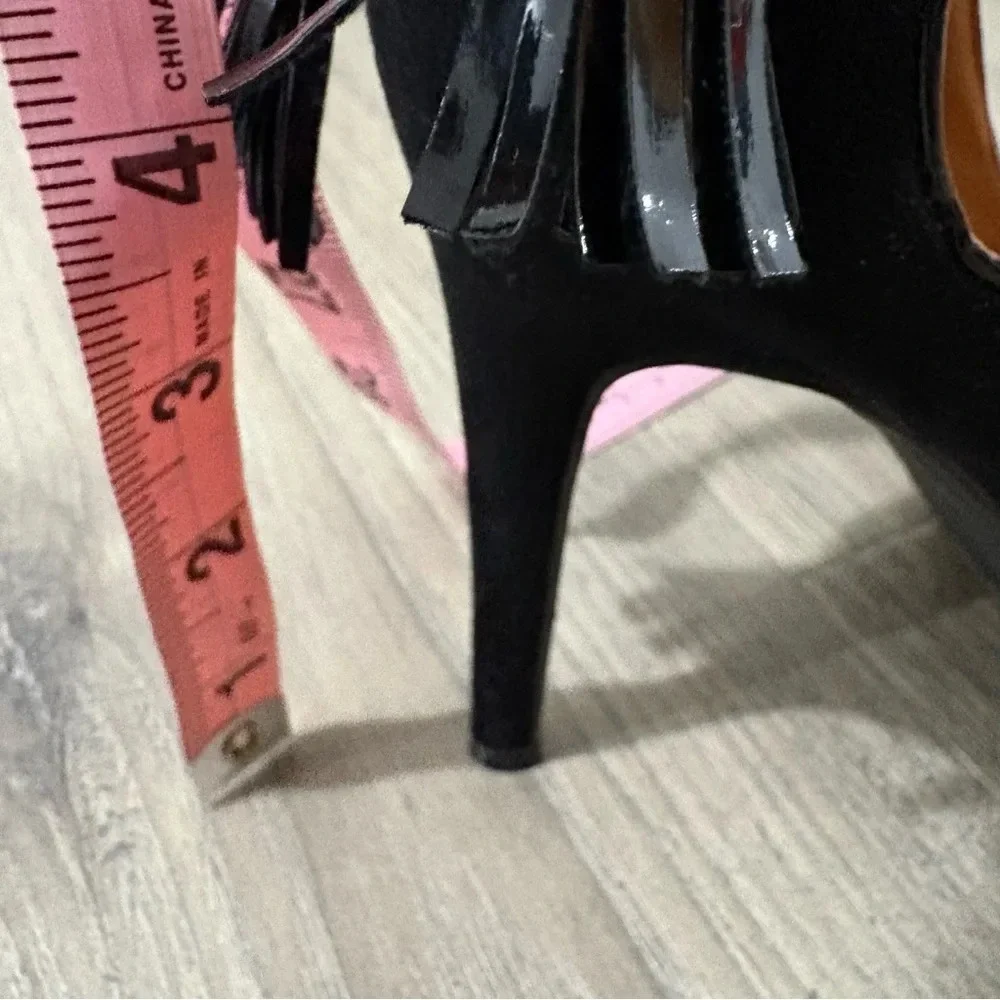 Toi Et Moi Pointed Toe Teardrop‎ Cutout Back Black Tassel Pump
